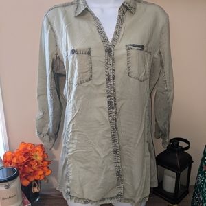 Green distressed blouse